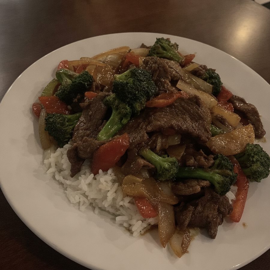 The same beef stir fry photo corrected to a bright, even exposure with the food clearly visible