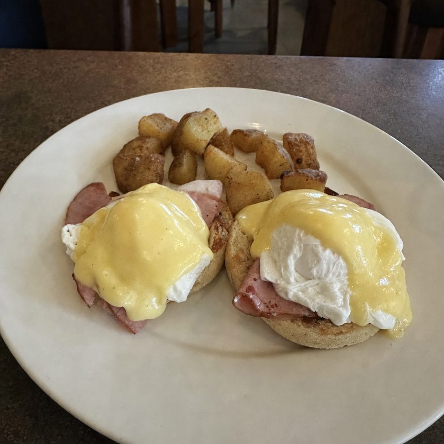 Ordinary flat, dull phone photo of a plate of eggs benedict